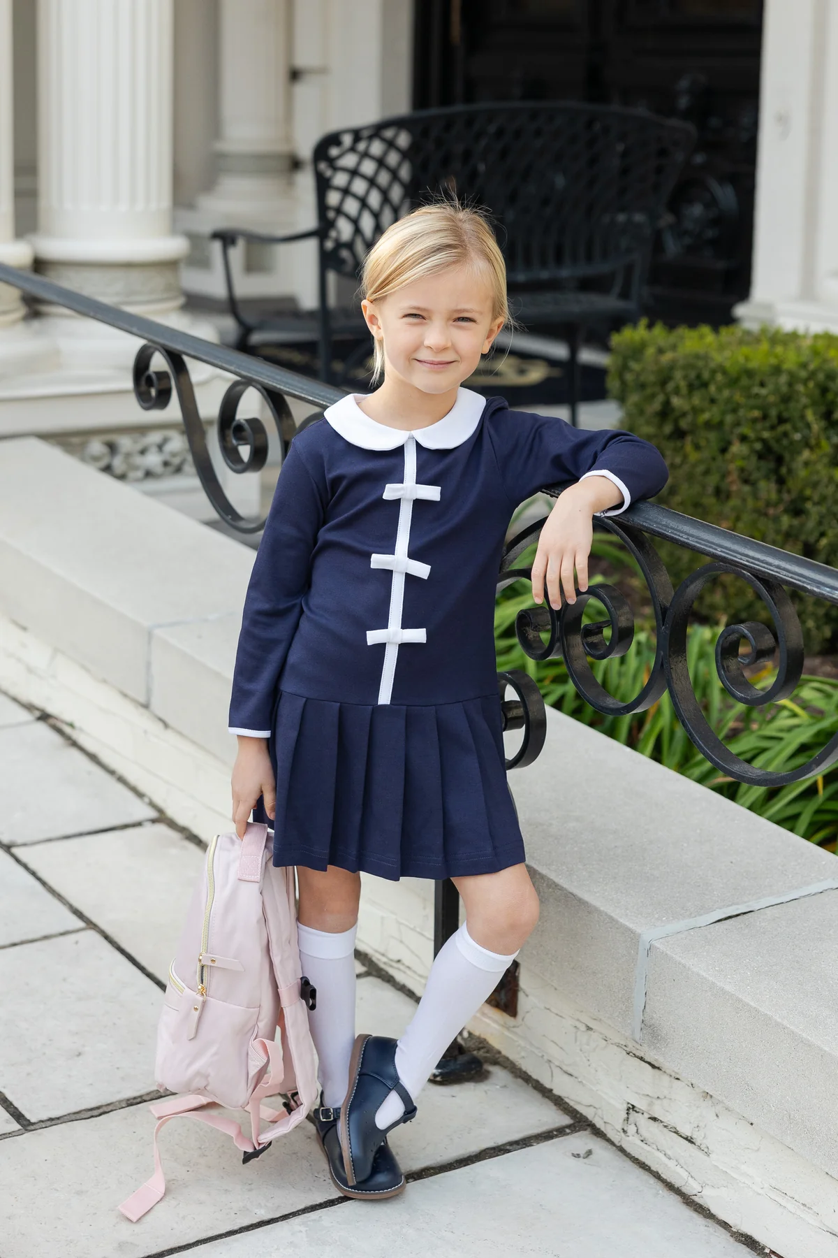 Knit Dress With Pleated Skirt And Bows